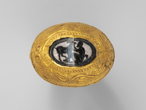 gemma-antiqua: Etruscan gold ring with a banded agate intaglio depicting a satyr and a goat, dated t
