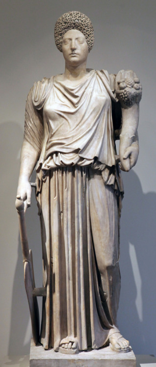 Roman sculpture of the Goddess Tyche-Fortuna with a hairstyle popular in the Flavian period (69-96 A