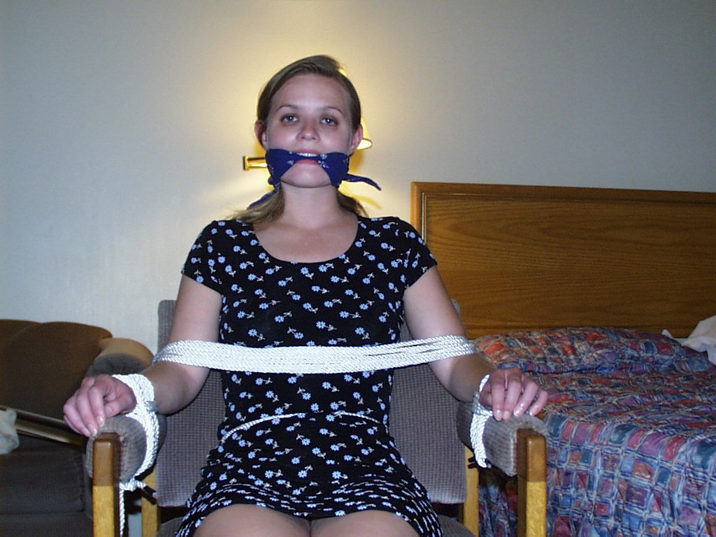 graybandanna:  Tied to a chair with a big blue bandanna gag 