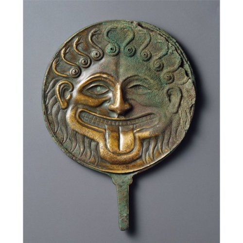 historyarchaeologyartefacts:Hand mirror (bronze: 20.2 × 15 × 2 cm) decorated with the head of Medusa