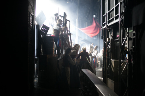 A view of the Barricade from the wings as the Students take their positions. Photo by maxgordonphoto