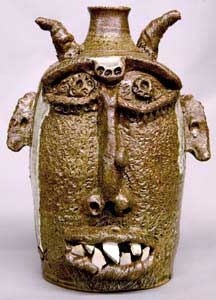 According to Jim McDowell of www.blackpotter.com: UGLY FACE POTTERY. First made for