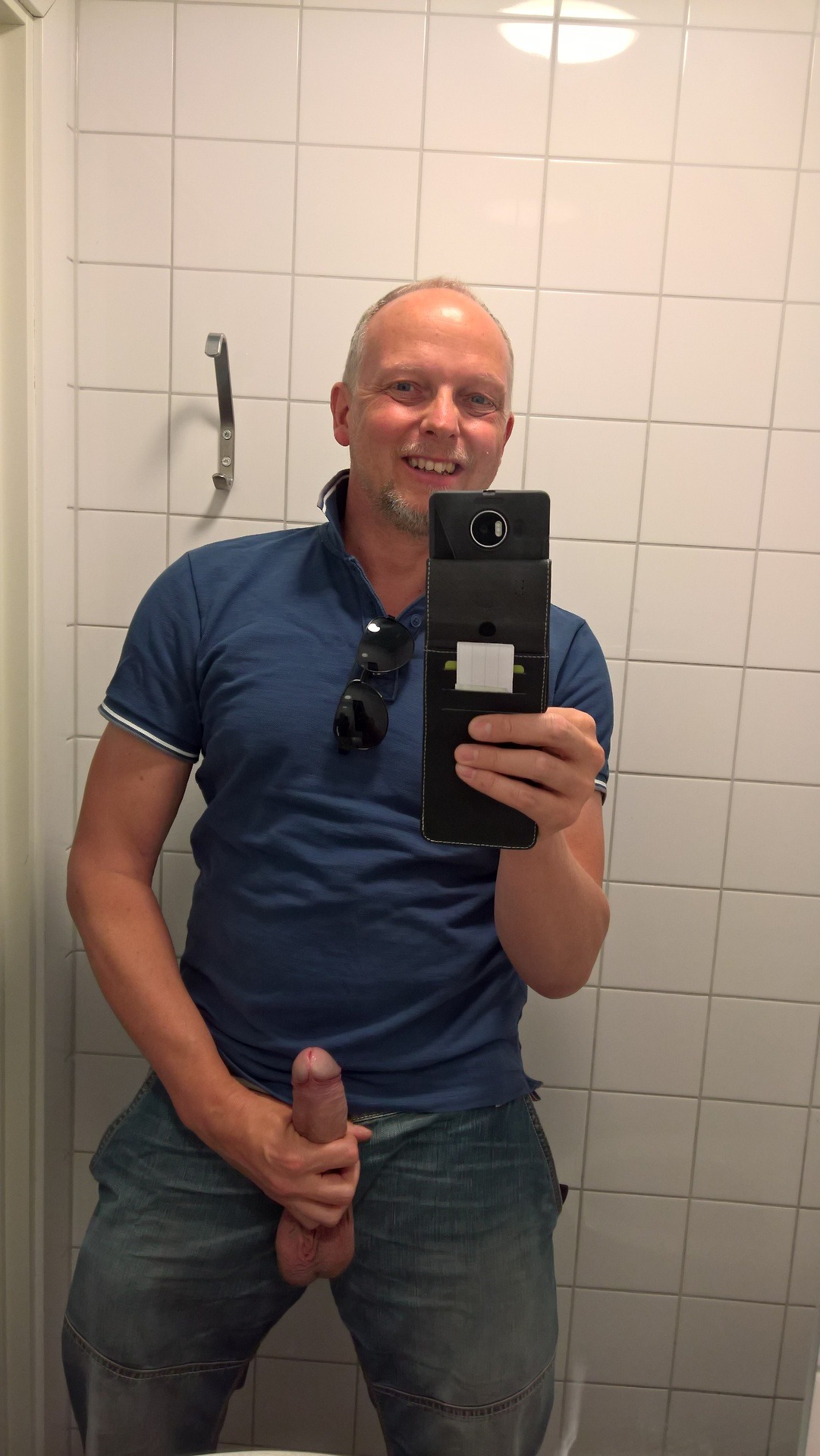 On vacation. Visiting a public toilet. I needed to flash my flacid and erect cock