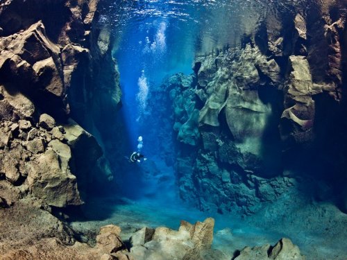 scienceisbeauty:  Located in the Þingvallavatn Lake in the Þingvellir National Park in Iceland, Silfra is crevice between the North American and Eurasian plates. Source: Tectonic Boundary Between the North American and Eurasian Plates (Travelycia)
