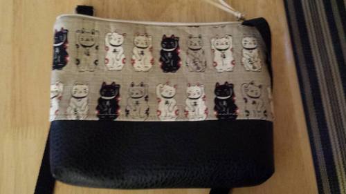 got this super cute maneki neko (lucky cat) purse today! May I become lucky in the future!