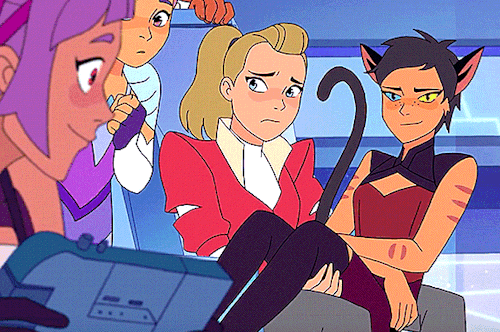 littlequietcanadian: Catra sitting in Adora’s lap She’s annoyed but she still holds her