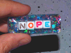 refutings:  thevintageloser:  ☹ Nope Glittery Iridescent Brooch or Hair Clip ☹    Refuted! 