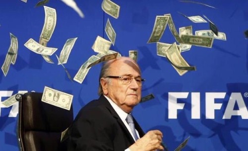 footballbl0g:  Comedian Lee Nelson crashes the FIFA conference, and throws money all over Sepp Blatter.