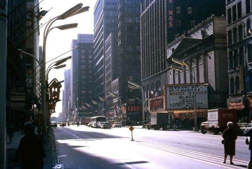 Looking south on State from Randolph, Christmas 1968, Chicago. Black Jesus is playing at the Ro