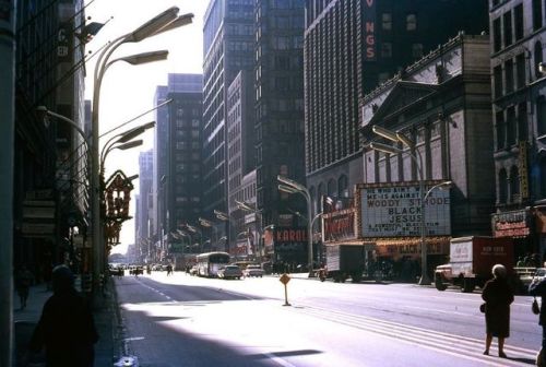 Looking south on State from Randolph, Christmas 1968, Chicago. Black Jesus is playing at the Rooseve