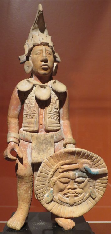 Mayan sculpture of a standing male warrior.  Artist unknown; Late Classic period (ca. 550-950 CE).  