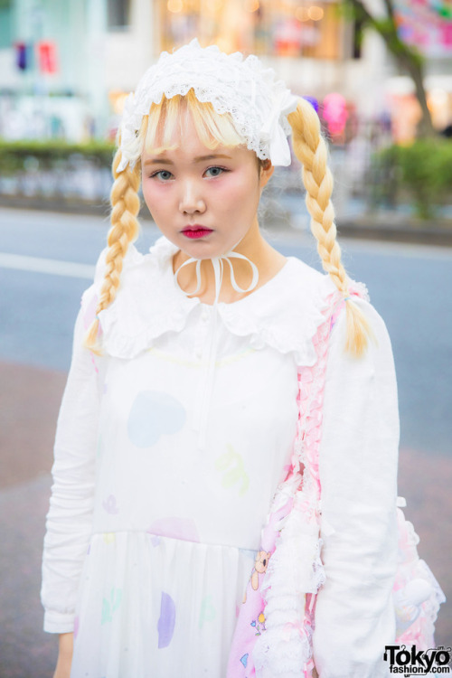 19-year-old Jueun on the street in Harajuku wearing a pastel style with a sheer heart print dress, r