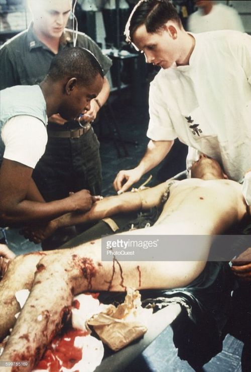 marine cpl j.a holland is given treatment on assault ship uss tripoly july 1967vietnam war 