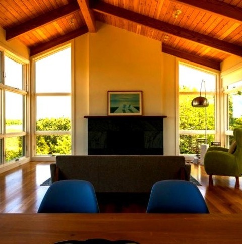 Living Room - Loft-StyleInspiration For A Mid-sized Coastal Loft-style Light Wood Floor Living Room Remodel