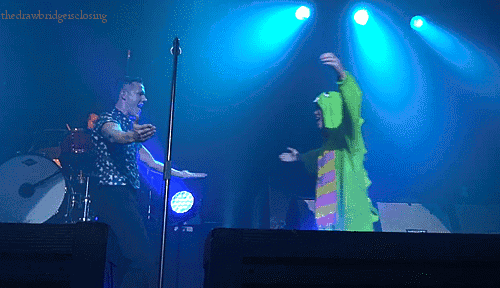 thedrawbridgeisclosing:  Cool guy dressed up like Gachapin during Read My Mind at Japan (video from Crystal_KILLERS) 