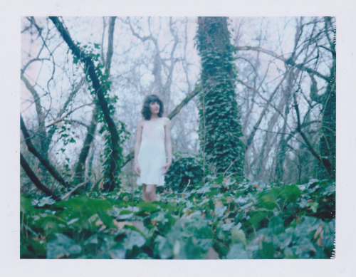 Here’s a polaroid of Kayla in the ivy. 