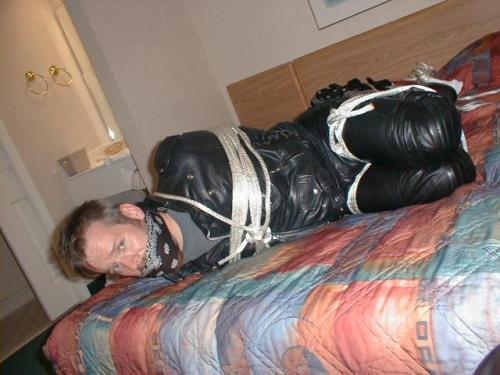 bubbabrando:  jhardcastle1976:  The best way to keep a guy in a leather biker jacket, tied up and his big mouth gagged  yes, it was quite effective. 