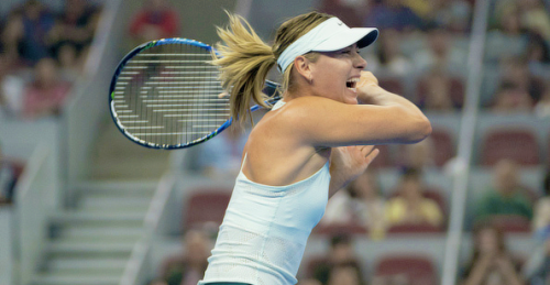 Maria Sharapova defeats Anastasija Sevastova 7-6, 5-7, 7-6 in the first round of the China Open.