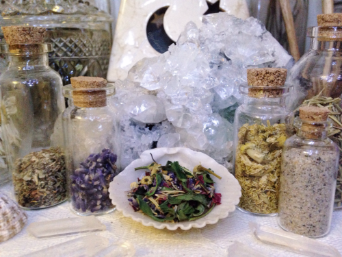 floralwaterwitch: ~ enchanting a special blend of herbs to be used in a water ritual 🐚🕯✨ Instagram angelinnapit / floralsgifts.com  