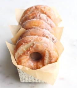 sweetoothgirl:   Sour Cream Cake Donuts with Maple Brown Butter Glaze    