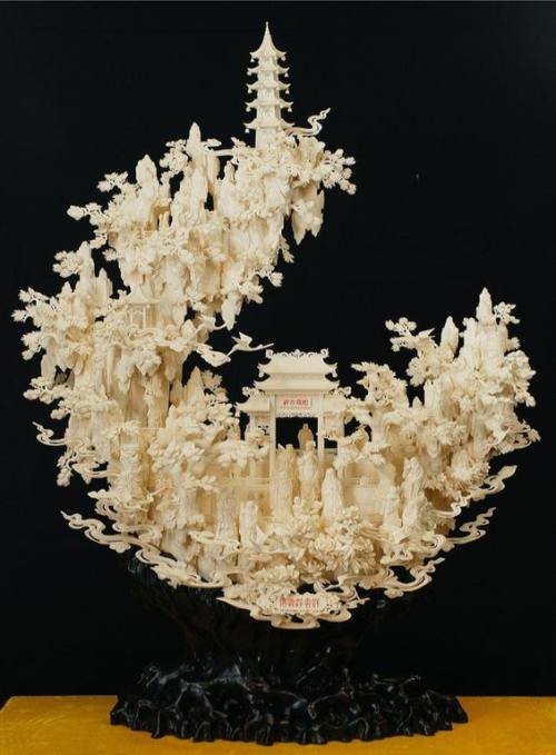 historical-nonfiction:This beautiful piece was carved by hand from camel bone! Depicting Kwanyin Mou