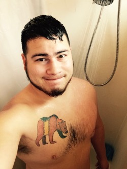 curiouscubb:  Need someone to wash my back!  Very nice tattoo and Cub ;)