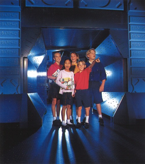 newwavearch90: CYBERPLAY - Kids internet cafe in Orlando, FL (1995) “This store resembles a movie set more than a retail space. Theatrical lighting and day-glow colors combine with burnished steel to create an interior design based on the helm of a