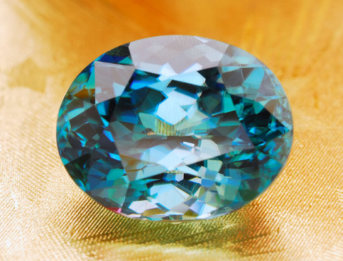 Eye clean Zircon with tropical sea blue color from Cambodia. The stone weighs 7.59 carats and has ex