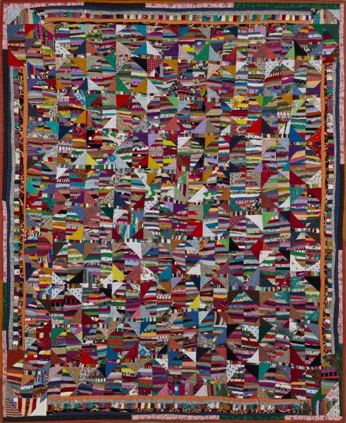 Imagine holding this quilt in your hands. What might it feel like? How would you describe the materi