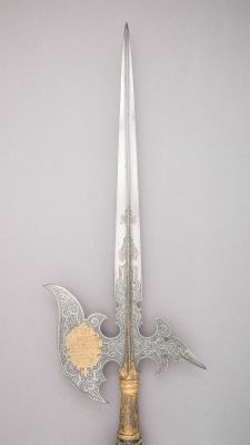 art-of-swords:  Halberd of the Guard of the Electors of SaxonyDated: circa 1620Geography: SaxonyCulture: SaxonMedium: steel, wood, gold, textile, metallic threadDimensions: L. 8 ft. 8 ½ in. (265.4 cm); L. of head 50 ½ in. (128.3 cm); W. 11 ½ in. (29.2