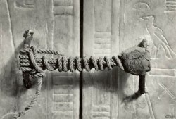 sixpenceee:  The unbroken seal on King Tut’s Tomb.The seal was actually a seal to the King Tut’s fifth shrine. The king  was buried in a series of four sarcophagi, which were in turn kept  inside a series of five shrines. That is the seal to the fifth
