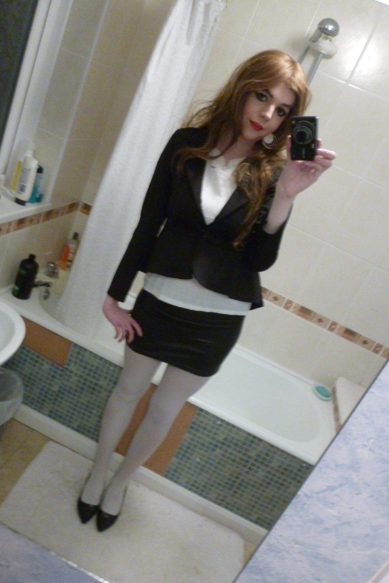 lucy-cd:  Pictures More business, with white tights. So cute &lt;3 
