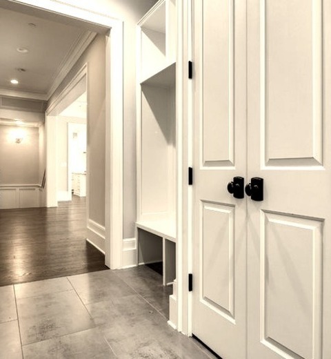 Transitional EntryEntryway - Mid-sized Transitional Medium Tone Wood Floor And Gray Floor Entryway Idea