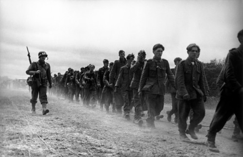 FRANCE. Off the coast of Normandy. June 6th, 1944. American troops transfer from troop ships to land