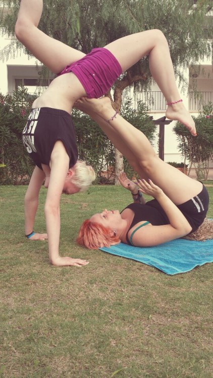 thegirlwiththeeverchanginghair:  MORE! Beth and I doing a bit of acro yoga in spain ^.^  