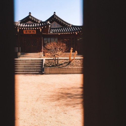 Snapshots from Buckhon Hanok Village’s Gahoe-dong, including the historic Baek In-je House (top), th