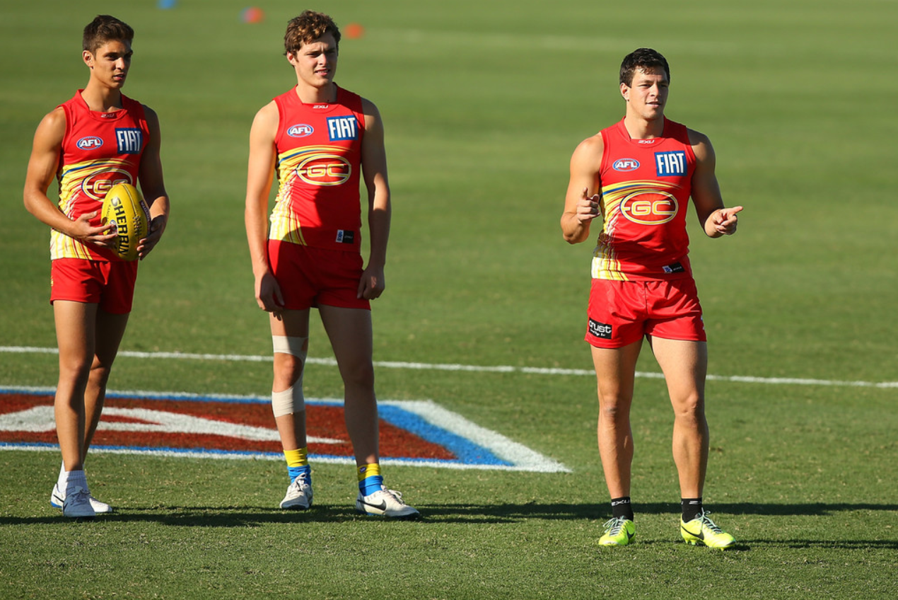 roscoe66:  David Swallow, Jaeger O’Meara and Jesse Lonergan of the Gold Coast Suns