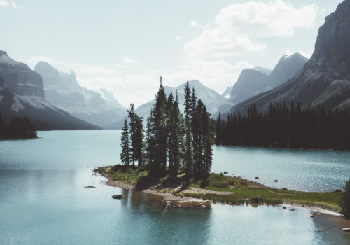 Canoeing to Spirit Island on Maligne Lake - Jasper National Park, Alberta, Canada.