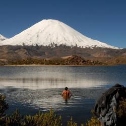 naturalswimmingspirit:  manwiththegoldenticketBack on US soil and in need of a bath. #skinnydipping #toomuchflying #chile #antiplano #parinacota