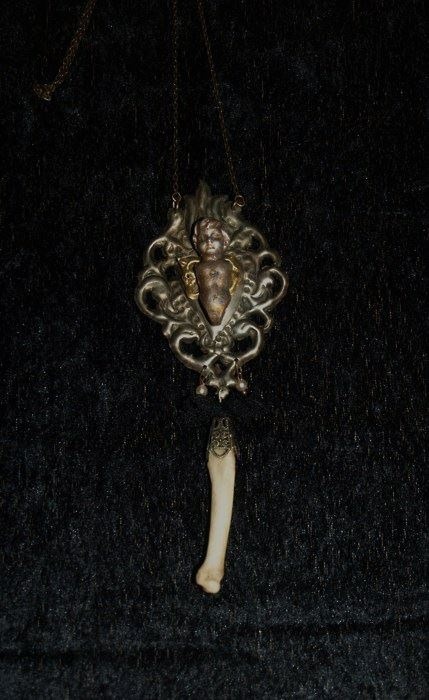 Mourning jewelry containing a finger bone porn pictures