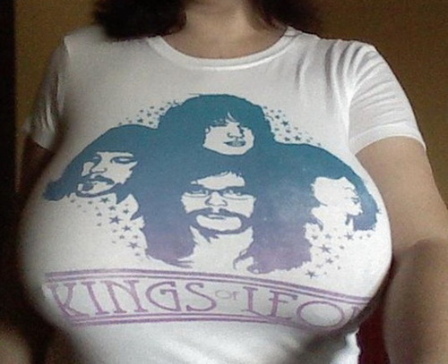 like the tee shirt how the faces look to be stretched from her huge tits love them like this in tight tops,xxxxxxxx.