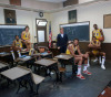 siphotos:
“ Members of the Los Angeles Lakers — Norm Nixon (10), Mitch Kupchak (41), Michael Cooper (21), coach Paul Westhead, Kareem Abdul-Jabbar (33), Jamaal Wilkes (52) and Magic Johnson (32) — sit in a classroom during an Oct. 1981 SI photo...