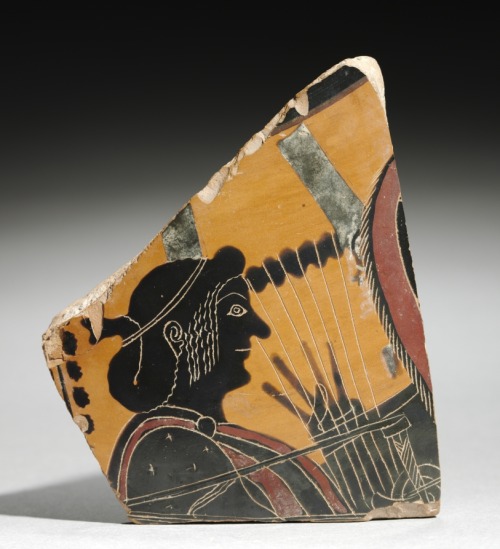 cma-greek-roman-art:Fragment of a Painted Vase: Head of a Musician Playing a Lyre, c. 520 BC, Clevel