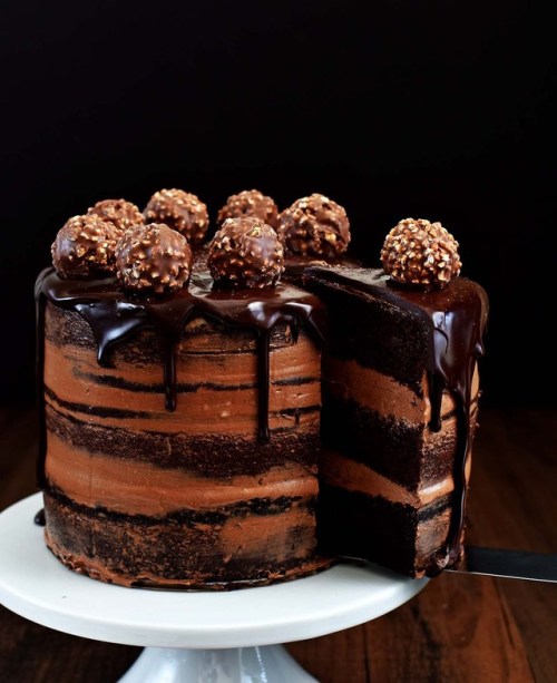 sexy-desserts:CHOCOLATE HAZELNUT SEMI NAKED CAKE WITH DARK CHOCOLATE GANACHE