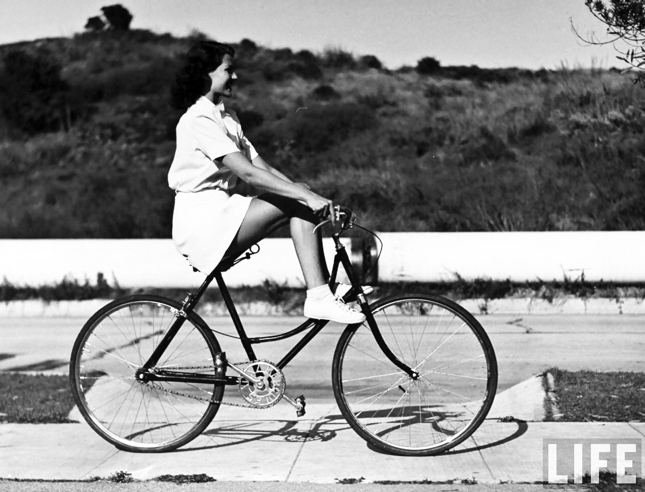 girlsandmachines:  Peter Stackpole -  Rita Hayworth trying out some new tricks on