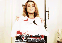 fullscircle:  Miley with uniforms of some brazilian soccer clubs. 