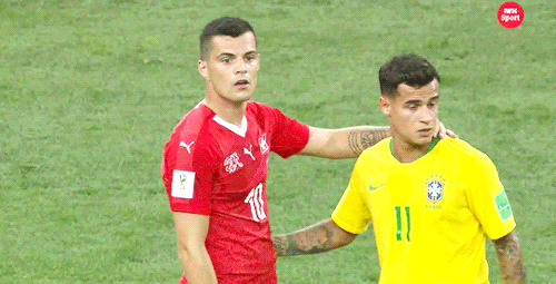 sashosasho:  Switzerland’s Granit Xhaka & Brazil’s Philippe Coutinho react when Xhaka was mistak