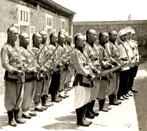 Chinese police officers employed by the Russians at Port Arthur, circa 1900.