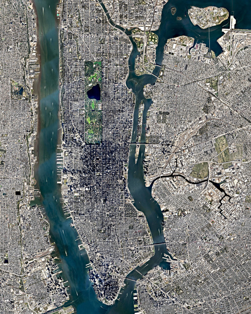 dailyoverview:Manhattan, seen at center, is the most densely populated borough in New York City and 