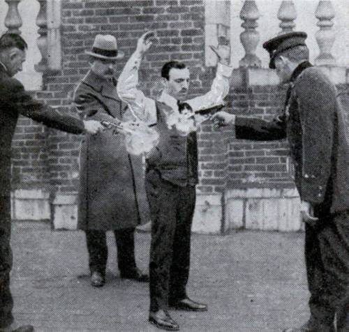 vintageeveryday:  In 1924, to demonstrate the effectiveness of a bullet-proof vest he invented, a New York man donned the garment, posed as the target and allowed three policemen to shoot at him at close range. Repeated fire of thirty-eight and forty-five